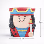 King-themed ceramic planter in red, blue, and yellow, 9 cm tall, from Germiant