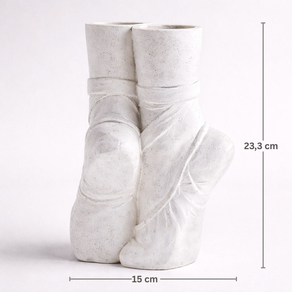White ceramic vase with measurements on a white background