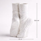 White ceramic vase with measurements on a white background