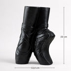 Black leather ballet shoes with measurements on a white background
