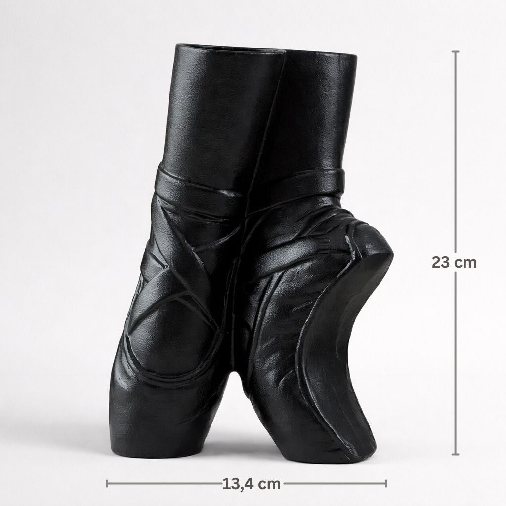 Black leather ballet shoes with measurements on a white background