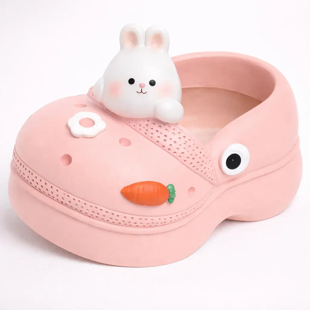 Pink clog-style shoe planter with cute bunny, carrot, and flower decorations, Germiant