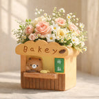 Cute bear bakery flower pot with pastel roses and daisies, soft sunlight, Germiant decor