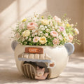 Cute cat cafe ceramic vase with pastel flowers, roses, and baby's breath arrangement
