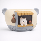 Cute ceramic planter with dog in window, decorative mini shop, Germiant home decor.