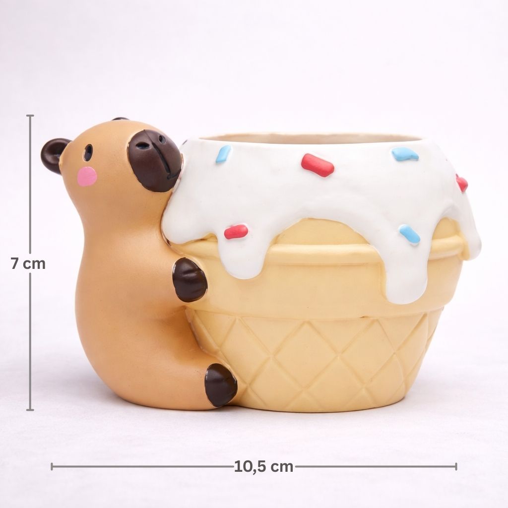 Capybara-shaped ice cream cone planter with measurements on a white background