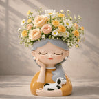 Decorative figurine of a girl with flowers on her head and a dog by her side, set against a neutral background.