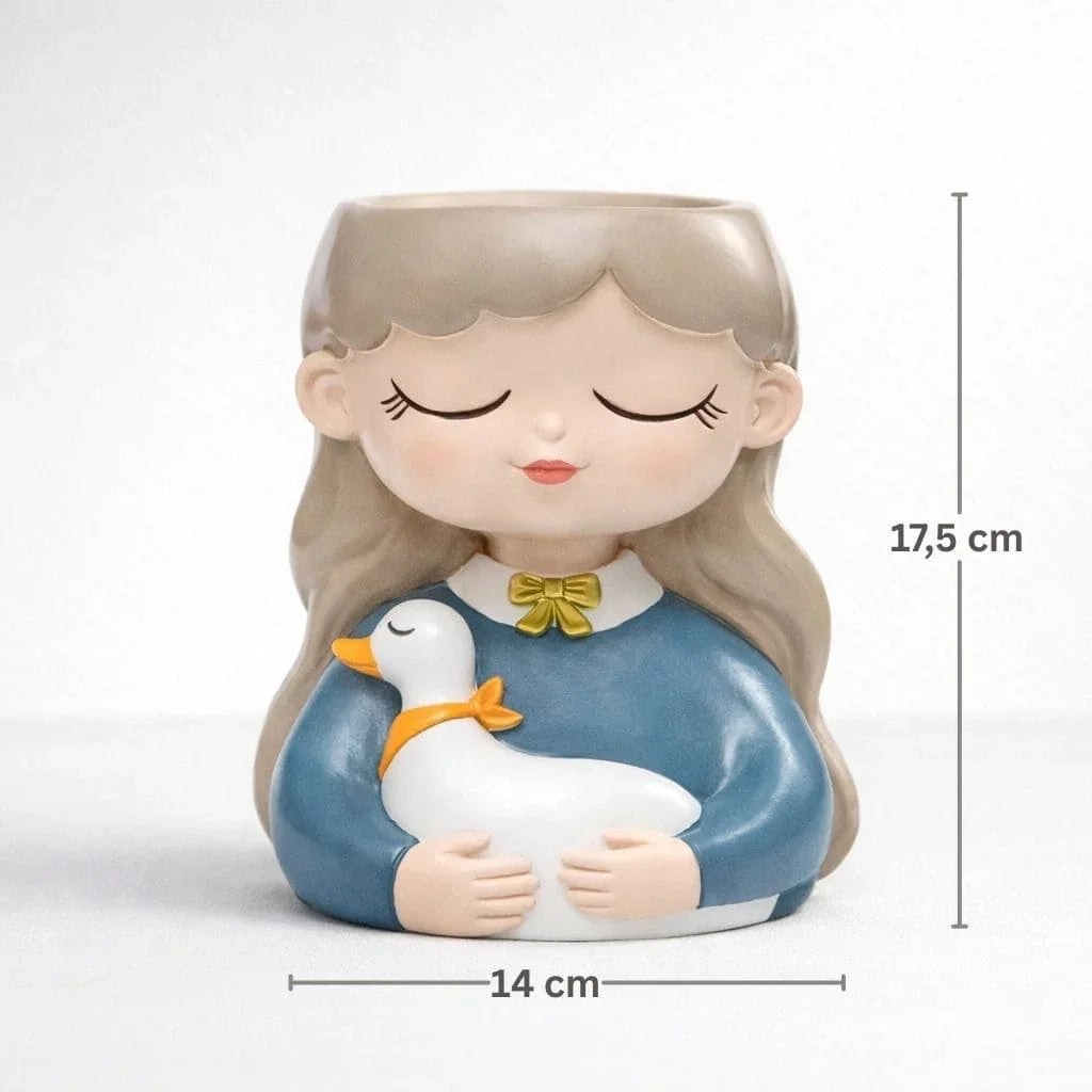 Decorative vase figurine of a girl holding a duck with measurements on a white background