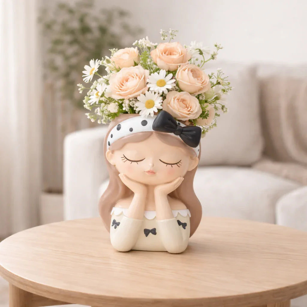 Ceramic girl head planter with peach roses and daisies on a wooden table, Germiant decor