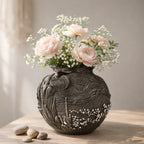 Textured ceramic vase with pink peonies and white baby's breath on wooden table, Germiant decor