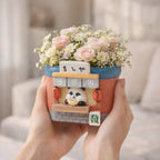 Cute panda flower pot with pink roses and daisies, held in hands, Germiant homepage image