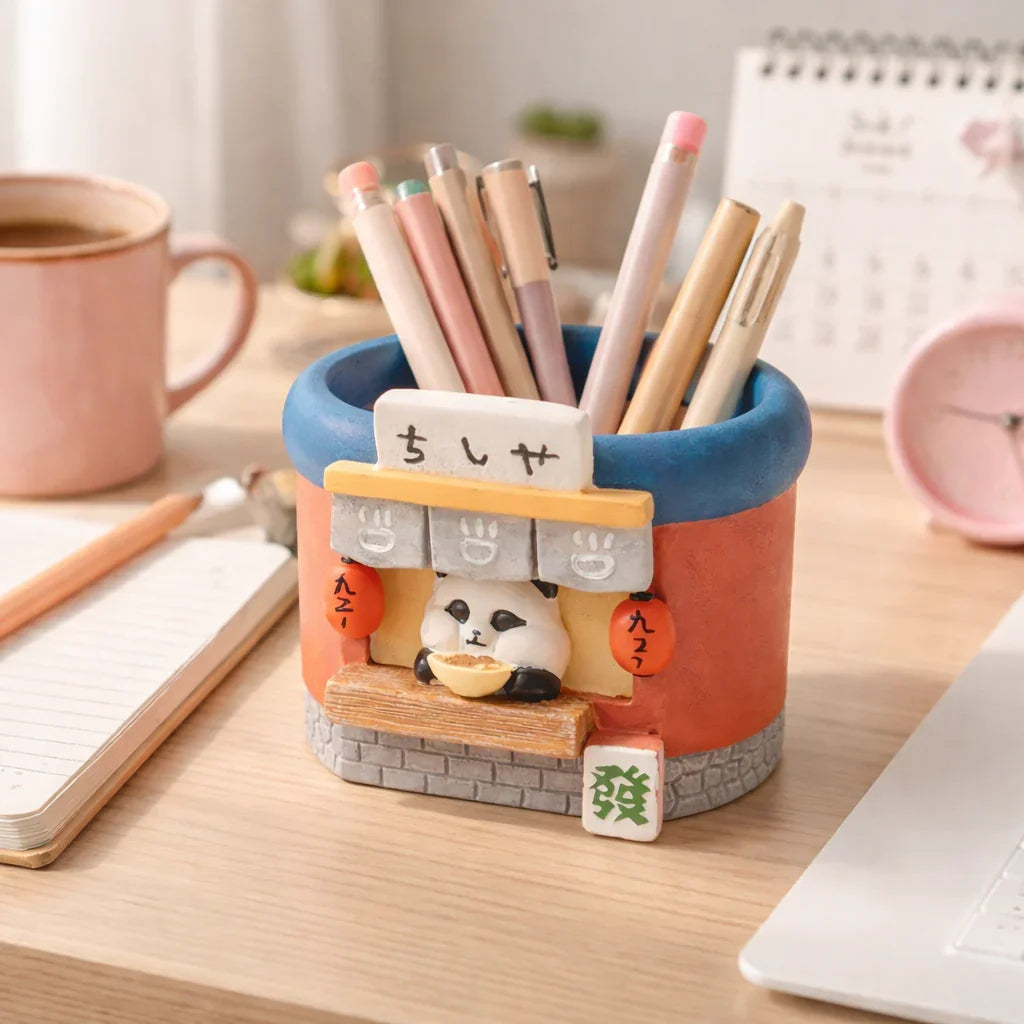 Cute panda pen holder with pastel pens on desk, cozy workspace decor from Germiant