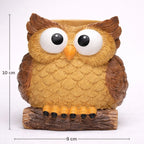 Owl-shaped planter with measurements on a white background