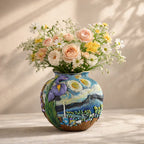 Colorful embossed vase with Van Gogh inspired design holding pastel roses and daisies, Germiant