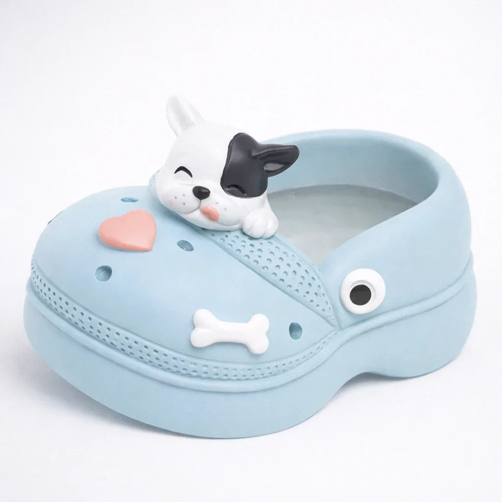 Light blue shoe planter with cute dog face, heart, and bone details from Germiant