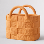 Textured orange handbag with two handles on a light gray background