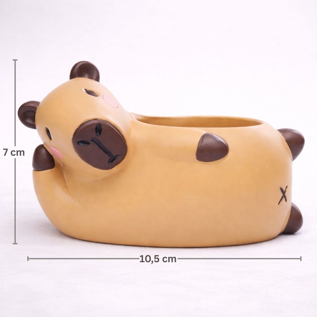 Planter shaped like a capybara with dimensions indicated on a white background